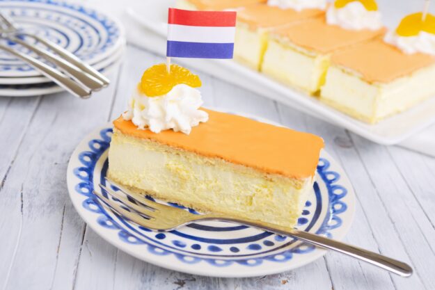 An,Orange,Tompouce,,Traditional,Dutch,Pastry,,On,A,White,Background.